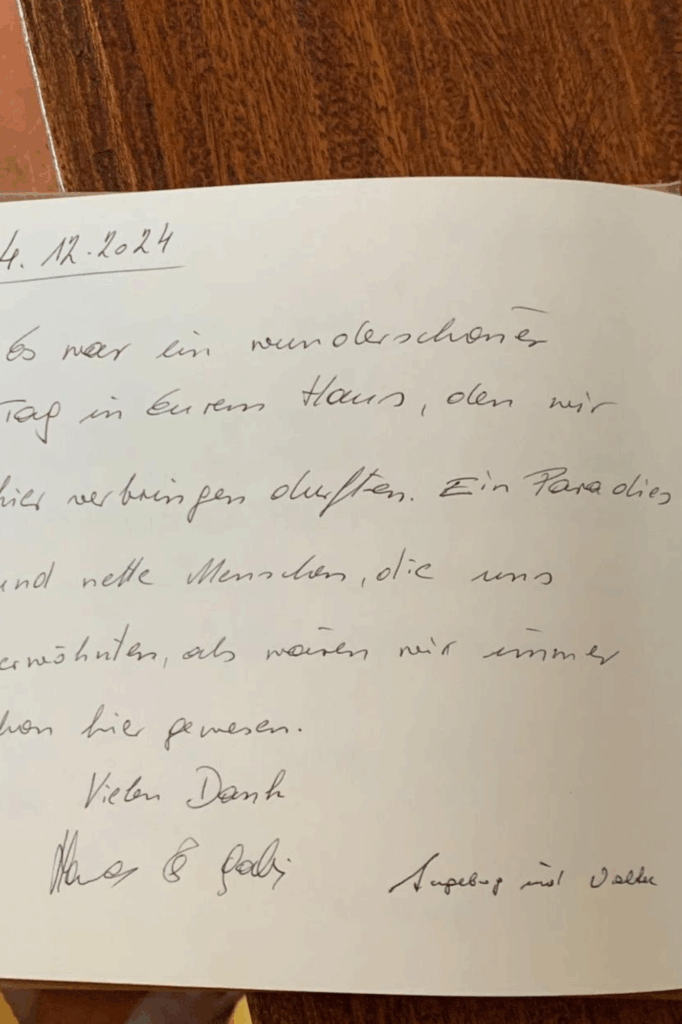 Handschriftliche Notiz auf einem weißen Blatt Papier mit Datum und Unterschrift von Victor Danz. - buchbar im Reisebüro Budde Urlaubseisen